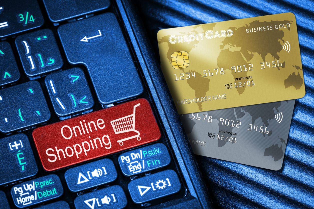 Credit Cards and Keyboard With Red Button Online Shopping Concept